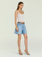 Model wearing Sabrina Boyfriend Short denim shorts with a white ribbed tank top and brown belt with gold jewelry. thumbnail image 4 of 5
