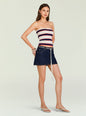 Theodora Knit Top strapless striped white with navy and red bands worn with a denim skirt thumbnail image 4 of 5