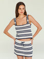 Model wearing Valeria Crochet Top navy and cream striped crochet knit tank with wide straps. thumbnail image 1 of 5
