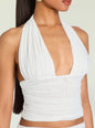 White halter top worn by a model on a light background thumbnail image 3 of 5