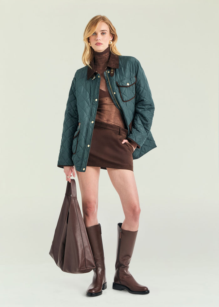 model wearing green jacket. image 3 of 6