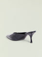 Black crocodile-embossed leather Bonnie mule with a pointed toe and mid heel viewed from the side thumbnail image 3 of 5
