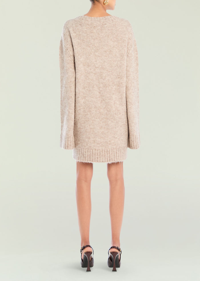 Back view of Daniela Sweater Dress in soft beige knit with long sleeves and ribbed hem