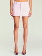Sofia Mini Skirt in pale pink on a model with belt loops and a front center seam thumbnail image 1 of 6