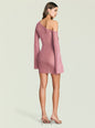 Profile view of a model in a pink metallic knit one-shoulder mini dress. thumbnail image 4 of 5