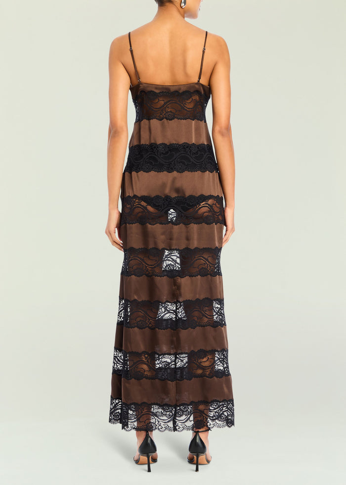 Back view of Faye Maxi Dress in brown satin with black lace panels and thin straps.