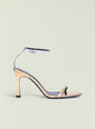 Fowla Sandal with a metallic silver ankle strap and beige toe strap on a high nude stiletto thumbnail image 1 of 5