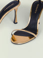 Gold metallic high heel sandal with black footbed and slim ankle strap thumbnail image 4 of 5