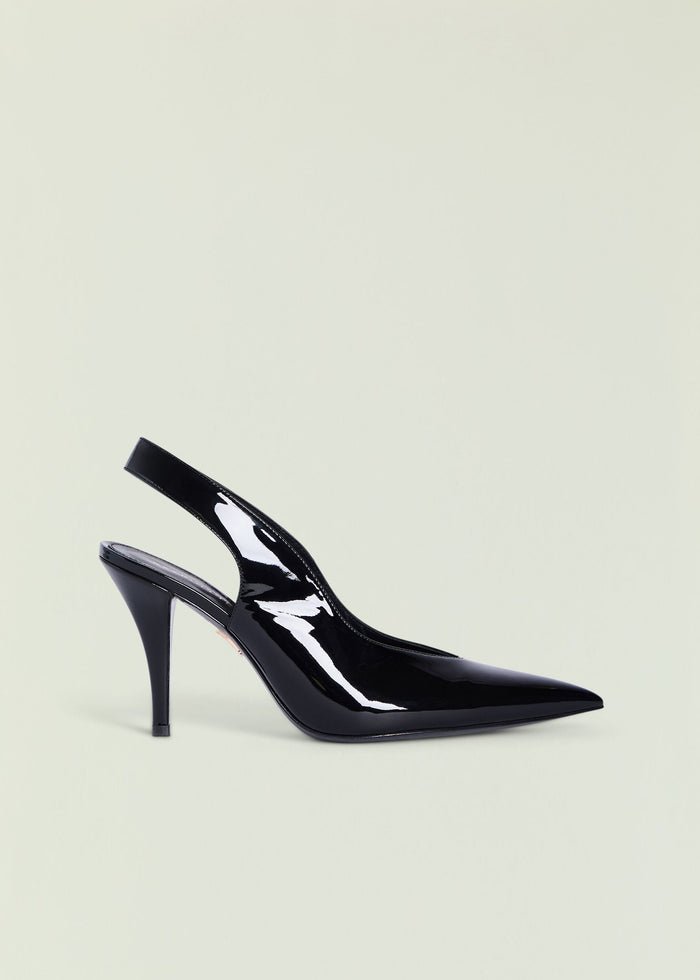 Black patent Maxime Slingback Heel with pointed toe and slender stiletto heel.