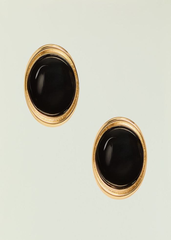 Sanaa Earrings gold circular frames with black enamel centers