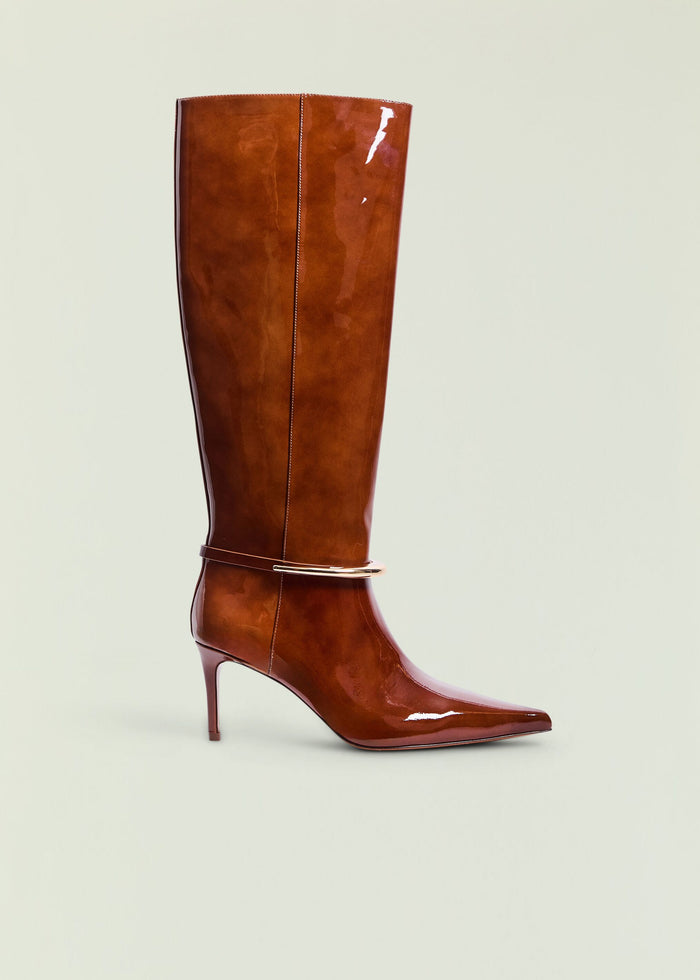 Sancia Boot brown patent knee high boot with pointed toe stiletto heel and ankle strap with gold ring