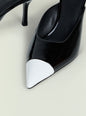 Allegra Leather Kitten Mule close-up of black glossy shoe with white toe cap. thumbnail image 4 of 5