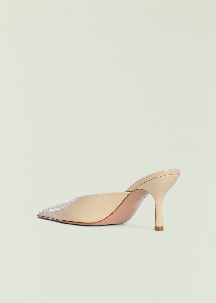 Close-up of Francesca kitten mule showing the nude croc-embossed leather upper and slim heel.
