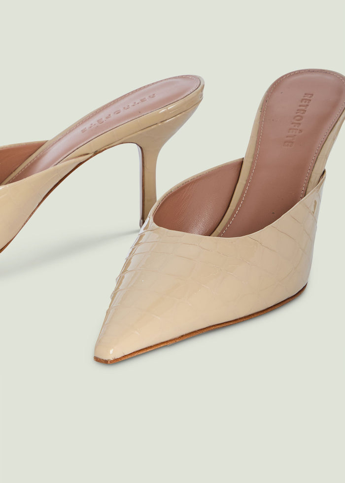 Beige crocodile embossed leather kitten mule with pointed toe and slim heel