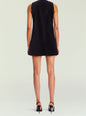 Back view of a sleeveless Maxine Velvet Mini Dress in black velvet on a model. thumbnail image 4 of 5