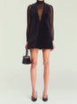 Front view of black velvet Maxine Velvet Mini Dress with a deep V neckline and small front pockets thumbnail image 1 of 5