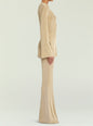 Side view of a model in a gold metallic knit top with matching knit pants. thumbnail image 3 of 5