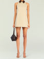 Beige Jiles Mini Dress with a brown velvet collar and front zip, shown with a black woven handbag. thumbnail image 1 of 5
