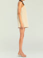 Side view of beige Jiles Mini Dress with brown velvet collar, sleeveless A-line silhouette. thumbnail image 3 of 5