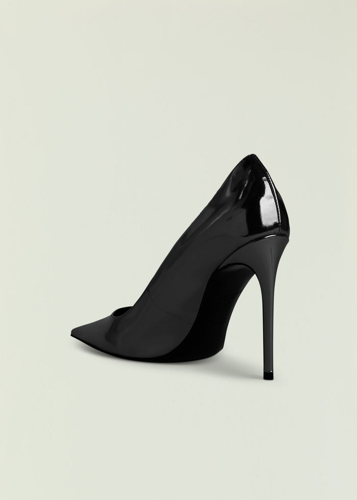 Close up of a black patent Jasmine Heel featuring a curved vamp and towering heel