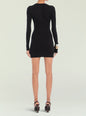 Back view of a black Lauren Mini Dress on a model with long sleeves and ribbed knit fabric thumbnail image 4 of 5