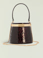 Lesla Case opened to reveal round mirror inside a dark crocodile-embossed exterior with gold hardware thumbnail image 1 of 3