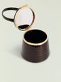 Lesla Case side view showing crocodile embossed black body and gold frame with a matching strap thumbnail image 3 of 3