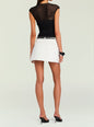Back view of Lille Mesh Top in black with ruched waist and sheer shoulders, worn with a white skirt. thumbnail image 4 of 5