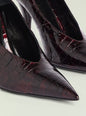 Maureen Leather Pump close up of glossy burgundy crocodile-embossed leather with pointed toe thumbnail image 4 of 5