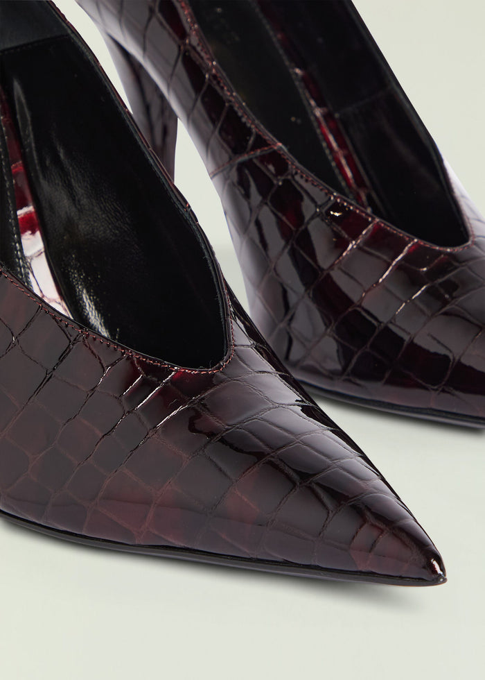 Maureen Leather Pump close up of glossy burgundy crocodile-embossed leather with pointed toe