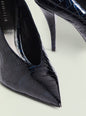 Close-up of Maureen Leather Pump showing glossy crocodile-embossed black leather and pointed toe. thumbnail image 4 of 5
