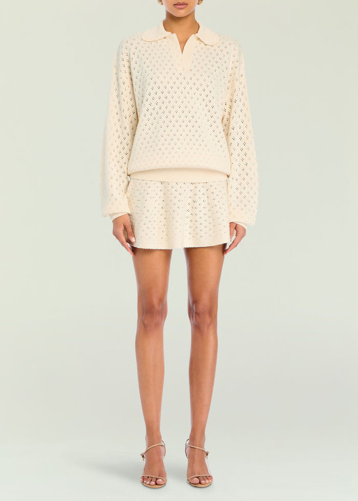 Ivory Mica Pointelle Knit Pullover with a collar and relaxed fit in a delicate eyelet knit.