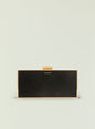 Milo Clutch black with gold metal frame displayed against a pale backdrop. thumbnail image 1 of 3