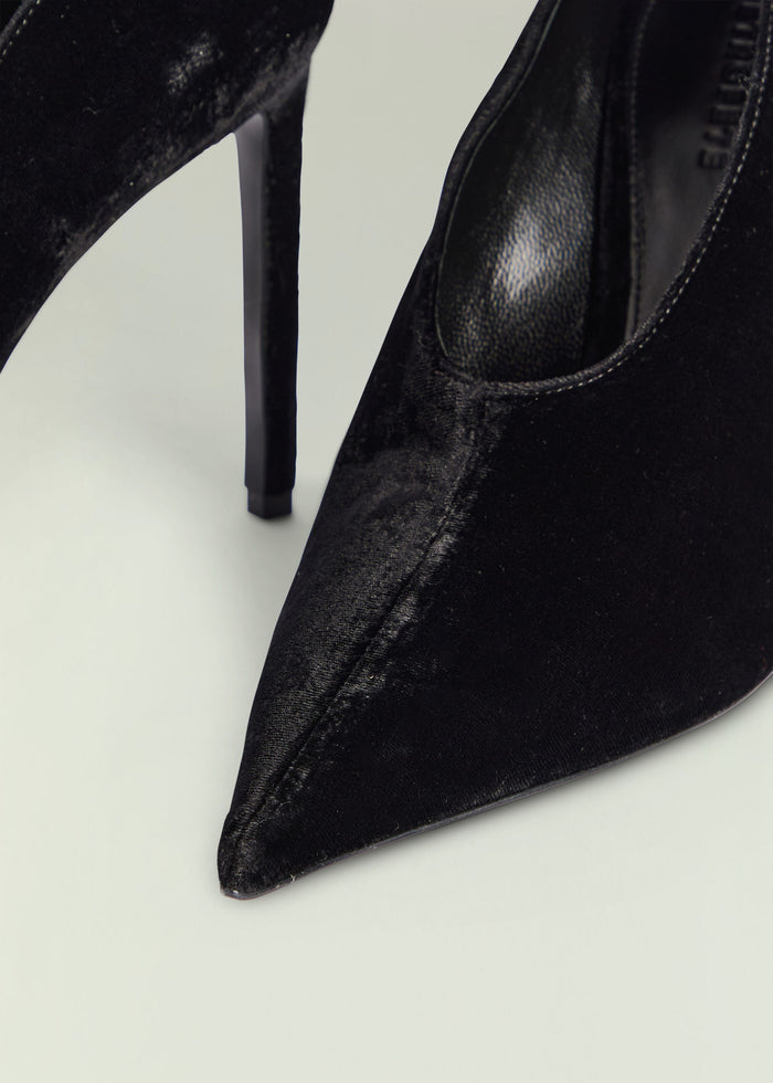 Close up of black velvet Mollie Pump showing the tall stiletto heel and inner edge