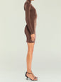 Side profile of brown velvet mock neck mini dress highlighting a fitted silhouette thumbnail image 3 of 5