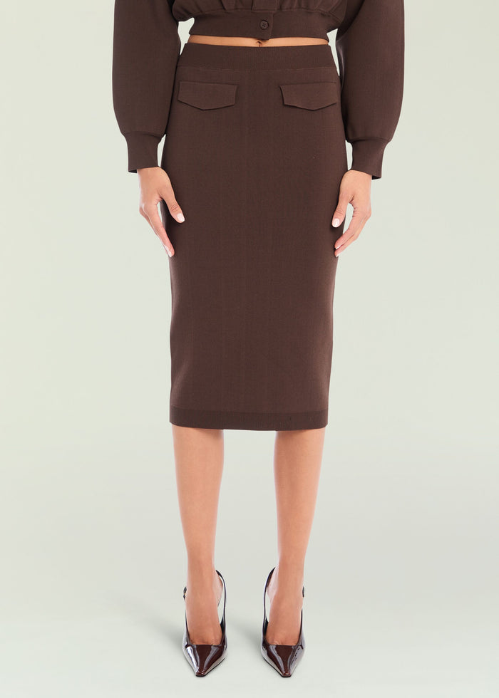 Back view of brown Opal Midi Skirt with two back pockets and ribbed hem