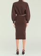 Back view of a brown cropped knit top with a matching midi skirt, showcasing an elastic waist. thumbnail image 5 of 5