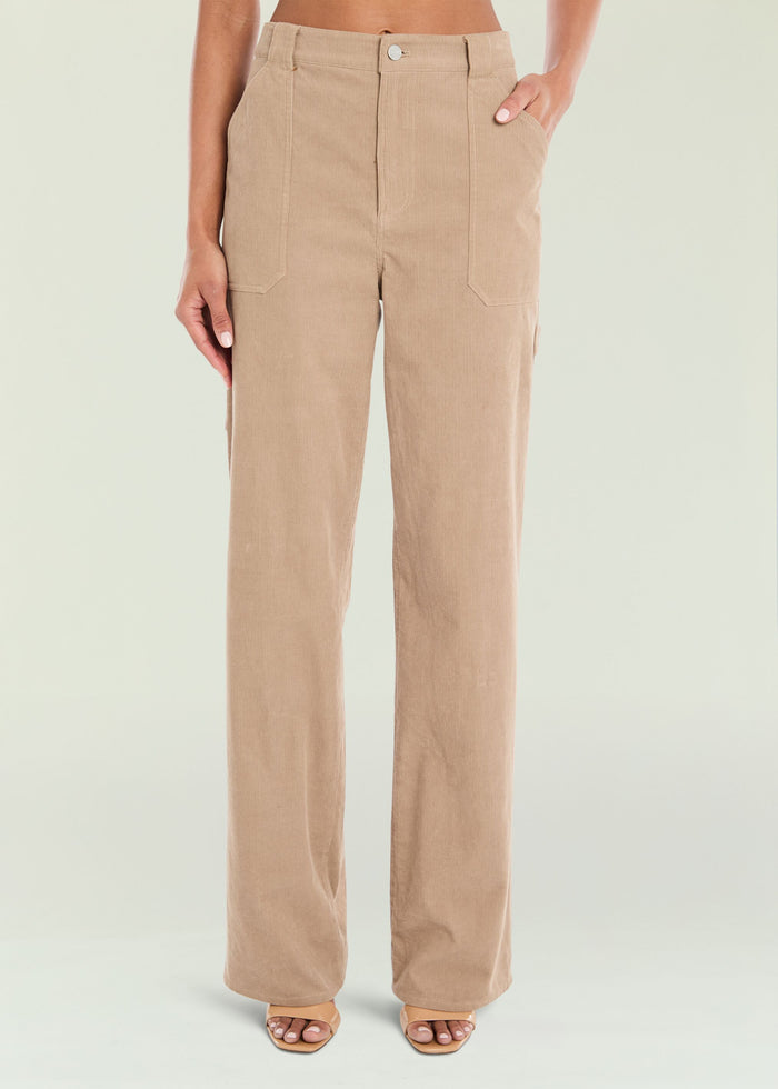 Front view of tan corduroy pants with hip pockets and wide, straight legs.