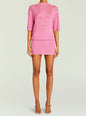 Front view of pink metallic knit Rae two piece set showing crew neck top and matching mini skirt with strappy sandals. thumbnail image 5 of 5