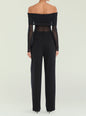 Back view of Rosa Top on a model, off the shoulder black top with ruched bands and sheer sleeves, paired with black pants. thumbnail image 4 of 5