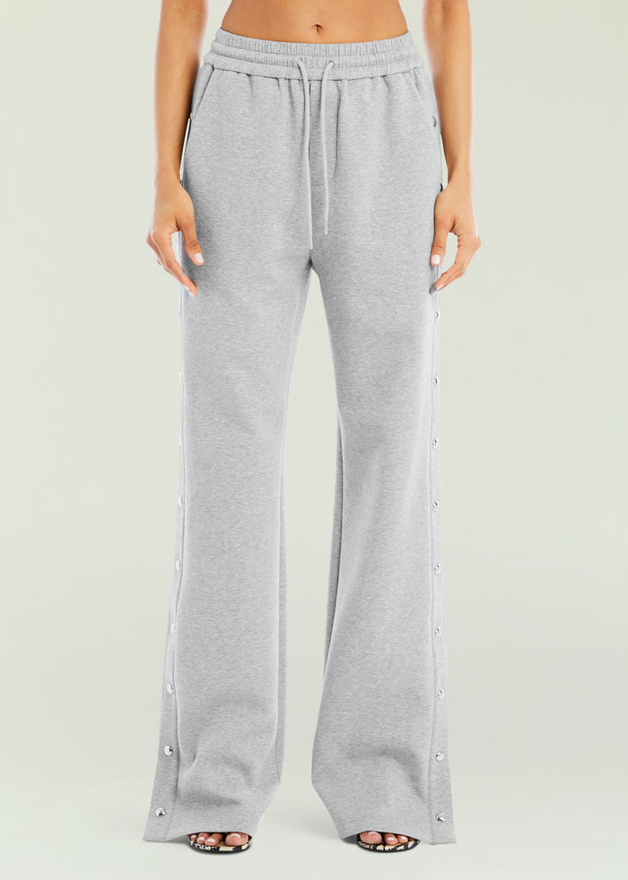 Front view of gray Lila Sweatpants with drawstring waist and side snap buttons
