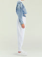 Side view of a model wearing a light blue denim jacket over a white top and gray Klara Sweatpant thumbnail image 3 of 5