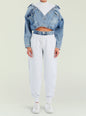 Full body shot of a model wearing light gray Klara Sweatpants with a cropped denim jacket over a white top thumbnail image 5 of 5