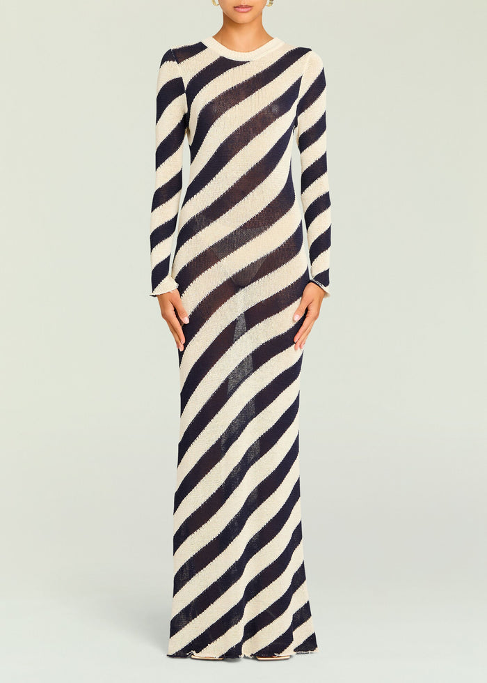 Rubi Knit Maxi Dress with navy and cream diagonal stripes worn by a model