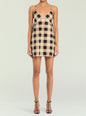 Front view of a beige and black gingham linen mini dress with thin straps. thumbnail image 5 of 5
