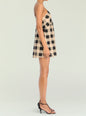 Side view of Shanty Linen Mini Dress in beige and black gingham with thin spaghetti straps thumbnail image 3 of 5