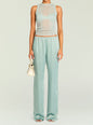 Model wearing mint Viva Satin Pant with elastic waistband and a sheer rib knit top. thumbnail image 5 of 5