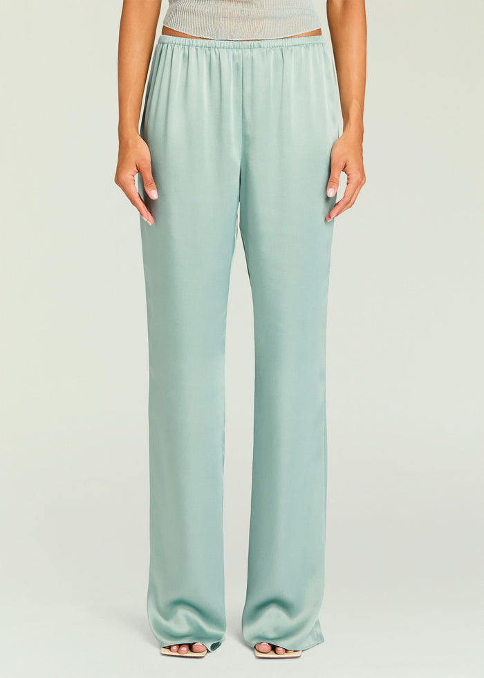 Close-up of mint Viva Satin Pant waist showing elastic waistband and smooth satin fabric.