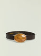 Dagmar belt with a large oval amber buckle on a black leather strap thumbnail image 1 of 2