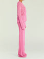 Side profile of a pink metallic knit top with matching pants on a model thumbnail image 3 of 5